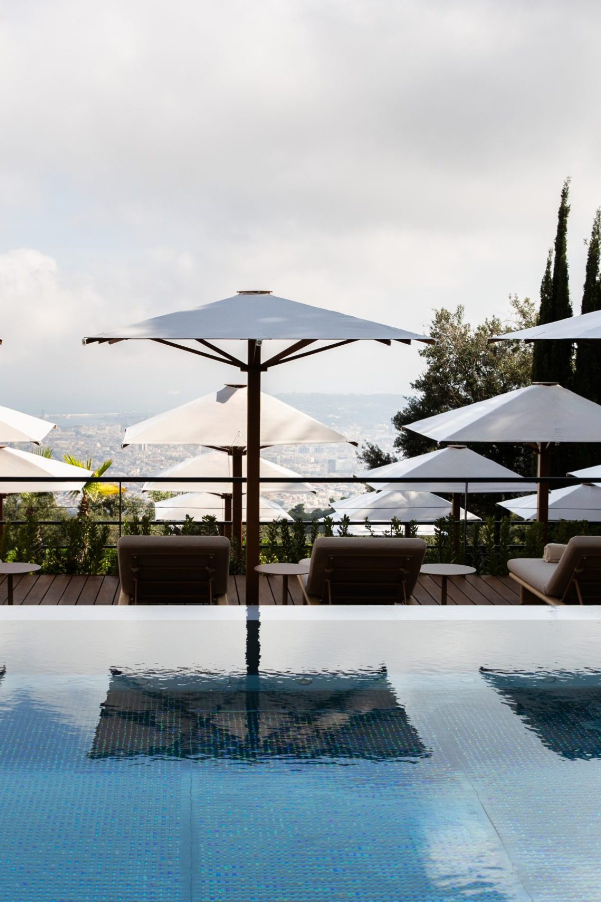 METT-Barcelona-Hotel-Pool-Club-Sunbeds-and-Skyline